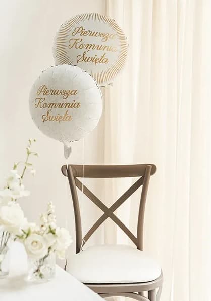 Balon z różowym nadrukiem "Pierwsza Komunia"